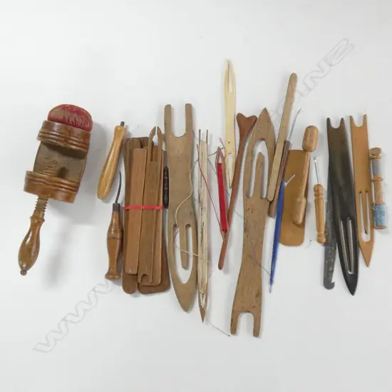 Assorted wooden sewing accessories.